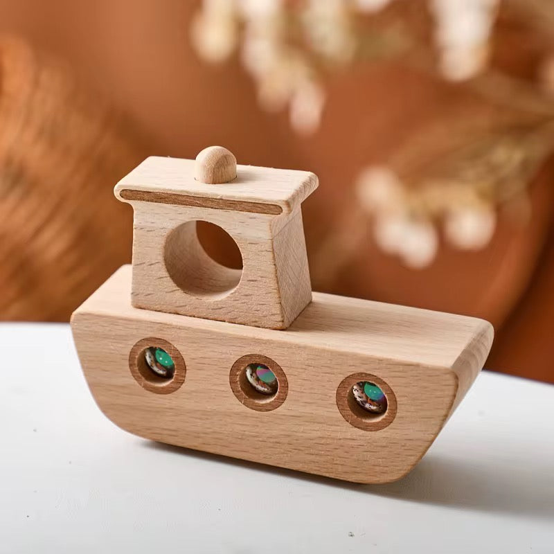 Montessori Holzboot mit Kaleidoskop-Fenstern
