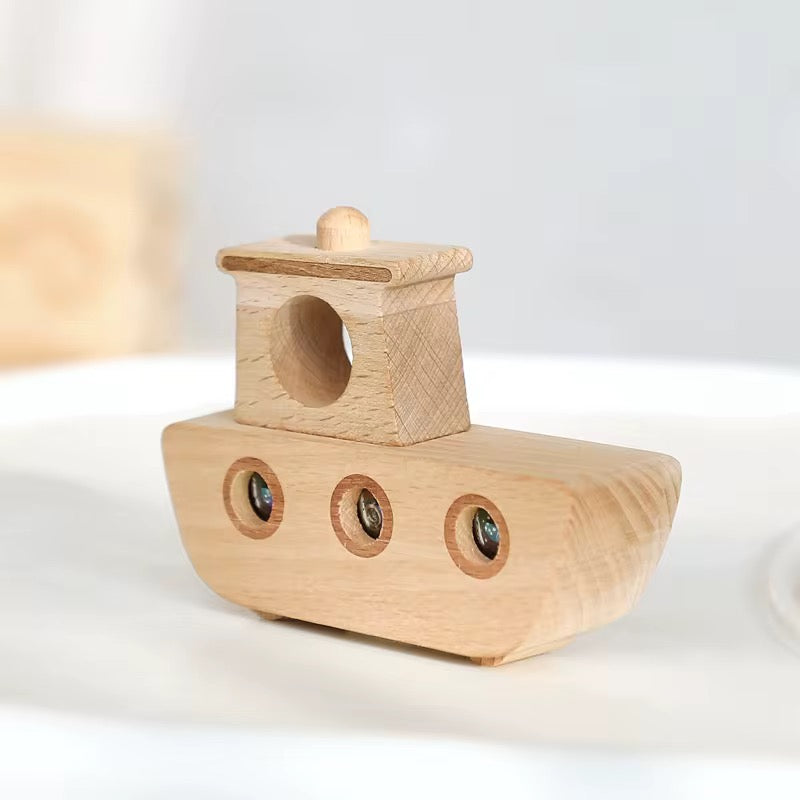 Montessori Holzboot mit Kaleidoskop-Fenstern