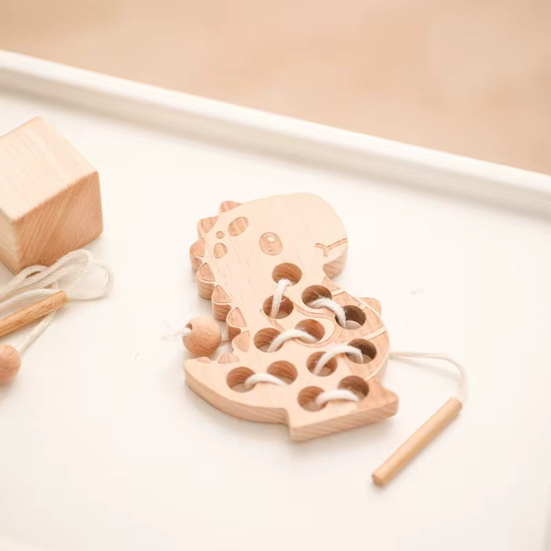 Montessori Dino Fädelspiel aus Holz