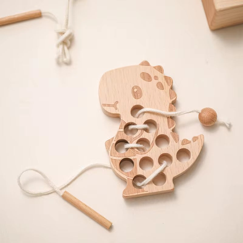 Montessori Dino Fädelspiel aus Holz